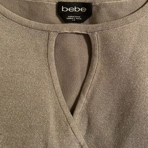 A silver glitter Bebe dress